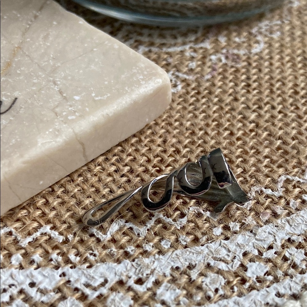 Silver ear cuff